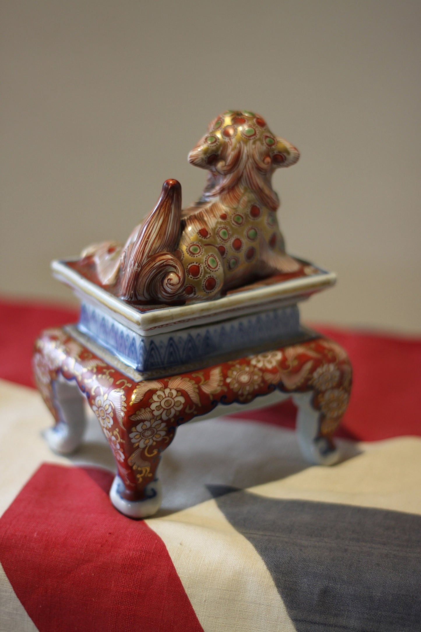 AJapanese Hirado or Koransha Porcelain Koro Hand Painted With Flowers Removable lid Surmounted With a Dog of Foo, 14cm high