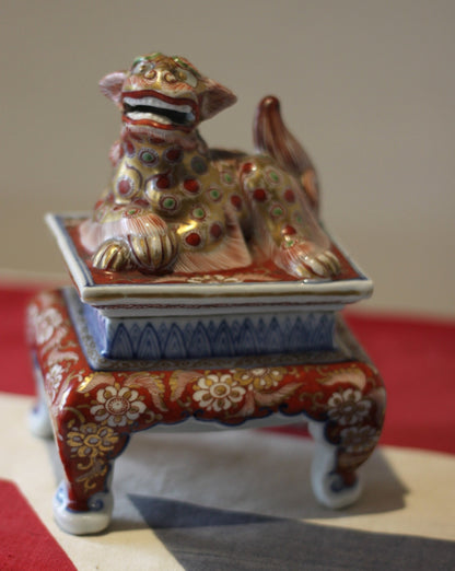 AJapanese Hirado or Koransha Porcelain Koro Hand Painted With Flowers Removable lid Surmounted With a Dog of Foo, 14cm high