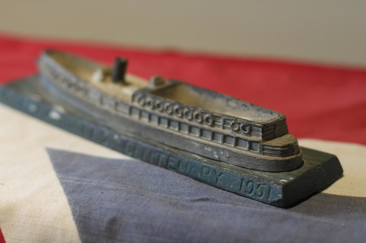 A heavy cast metal Randall's Centenary advertising ship desk paperweight 1851-1951