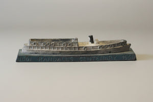 A heavy cast metal Randall's Centenary advertising ship desk paperweight 1851-1951