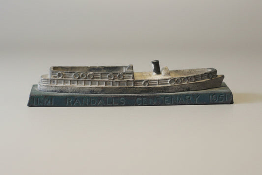A heavy cast metal Randall's Centenary advertising ship desk paperweight 1851-1951