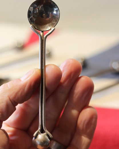 A set of Six Fantastic Arts & Crafts White Metal Spoons With Ball Terminals in the Manner of Christopher Dresser each 12.5cm in Length