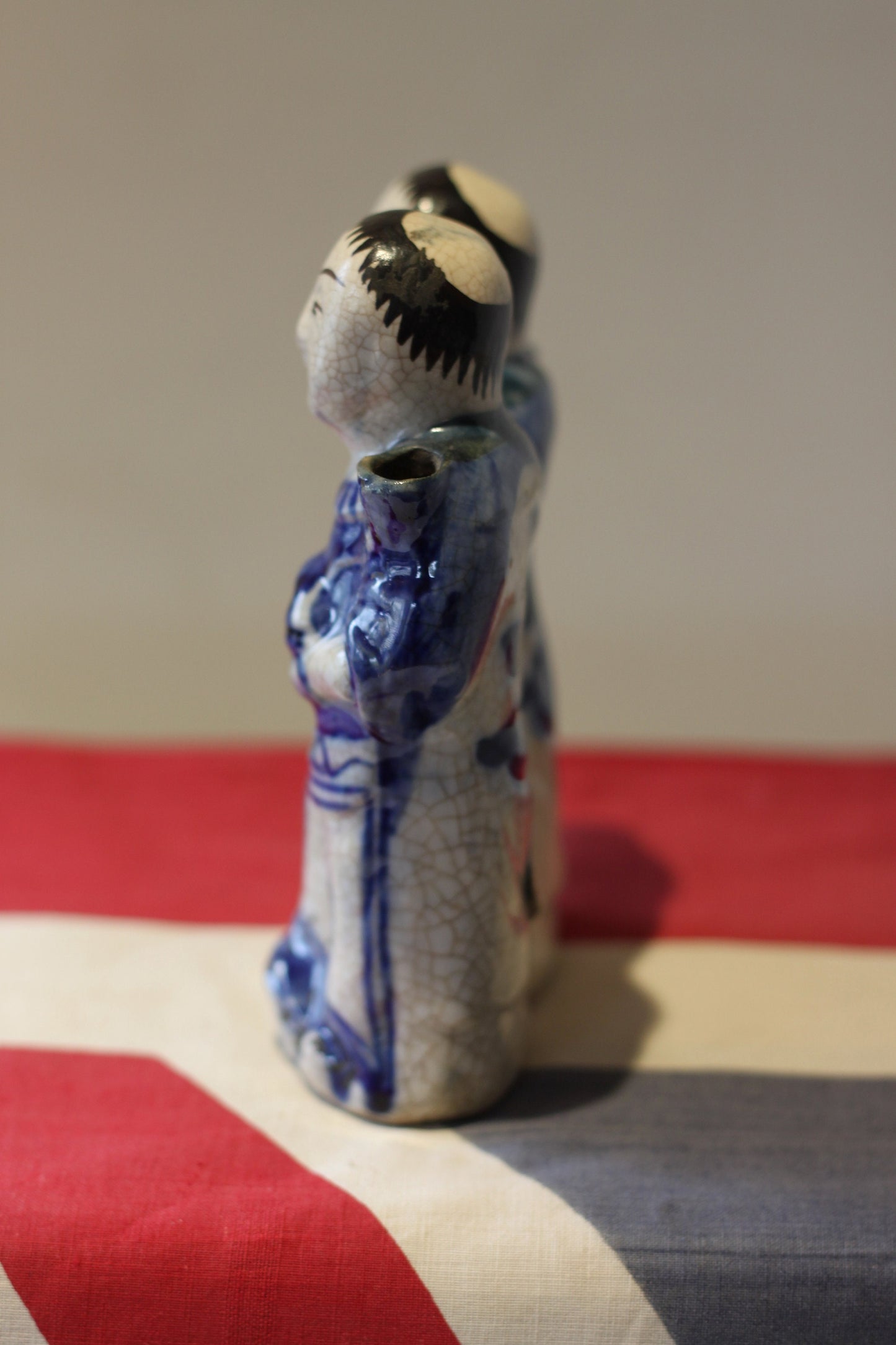 A Chinese Pottery Crackle Glazed He He Erxian Joss stick Holder 19th Century 15.5cm Tall