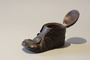 An Antique Carved Black Forest Boot Form Desk Ink Well 12x7cm