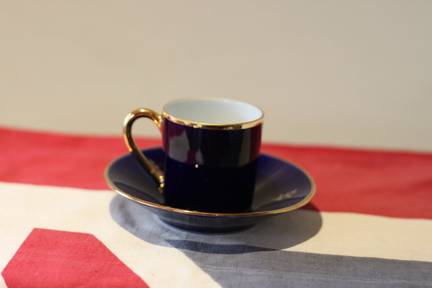 A Porcelain 'Florance Limoges' Coffee Cup and Saucer From France