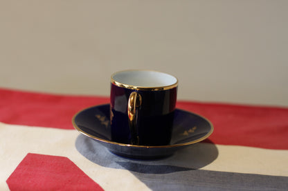 A Porcelain 'Florance Limoges' Coffee Cup and Saucer From France