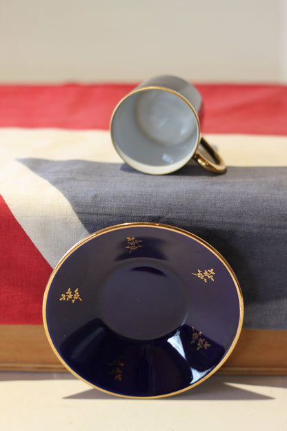 A Porcelain 'Florance Limoges' Coffee Cup and Saucer From France