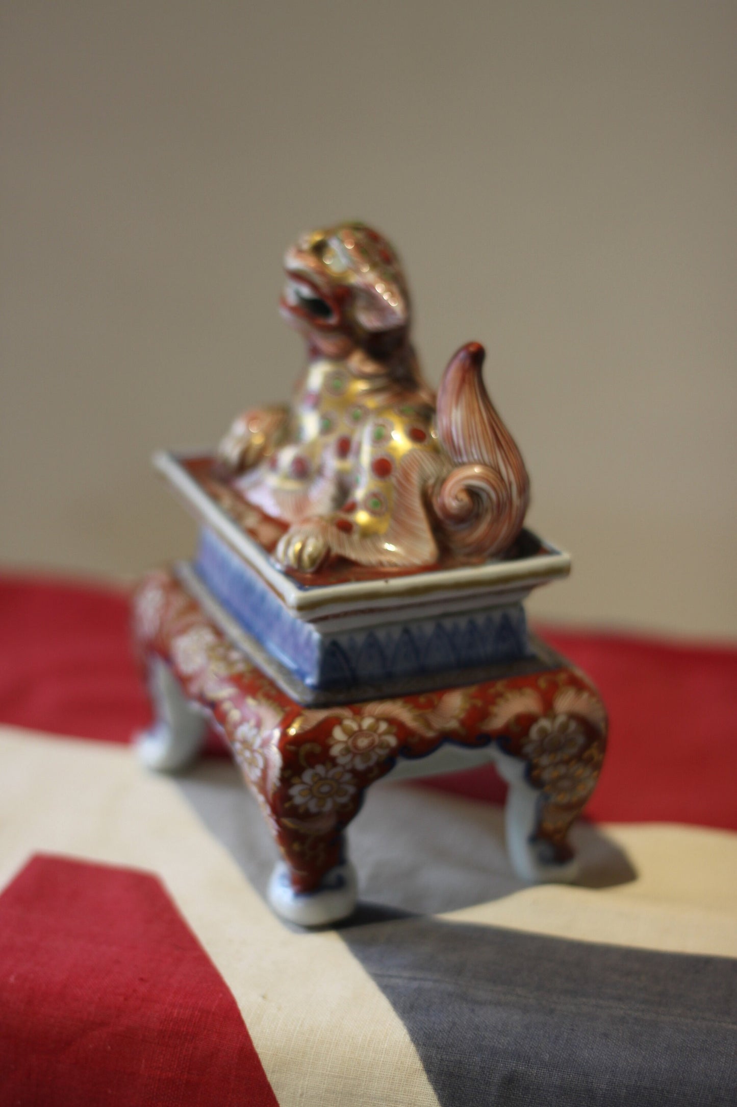 AJapanese Hirado or Koransha Porcelain Koro Hand Painted With Flowers Removable lid Surmounted With a Dog of Foo, 14cm high