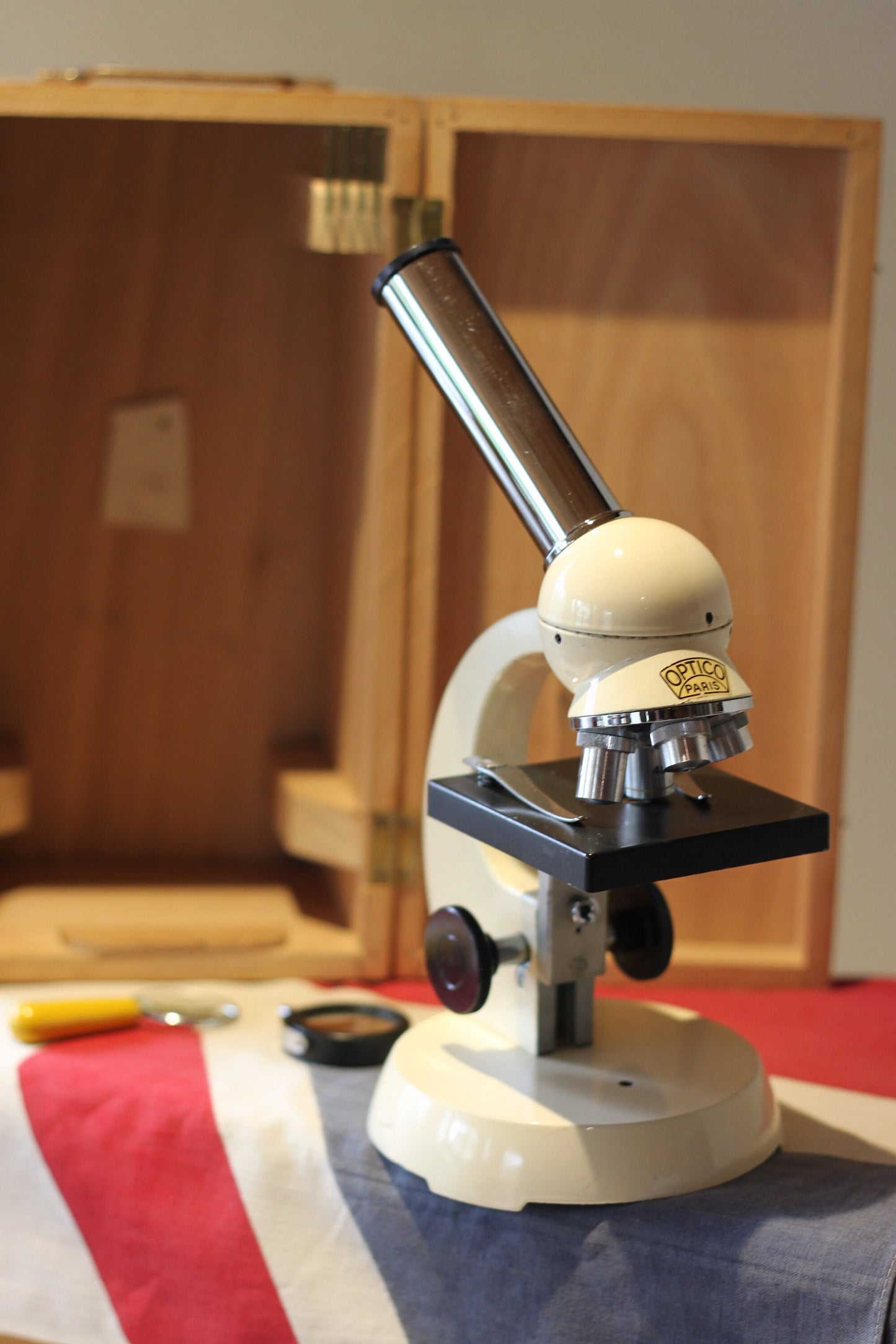 A Vintage 1950s Optico Paris Students Microscope in its 0wn Case and a Denhill Pancratic X25-X40 Telescope