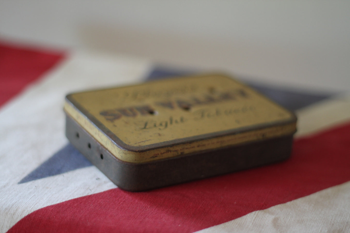 A Vintage Player's Sun Valley Light Tobacco Tin With Possible Bullet Holes 11x8x2cm