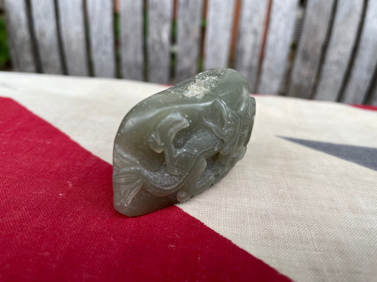 A Chinese Green Jade Pebble Hand Carved in Relief With a Dragon 6cm Wide