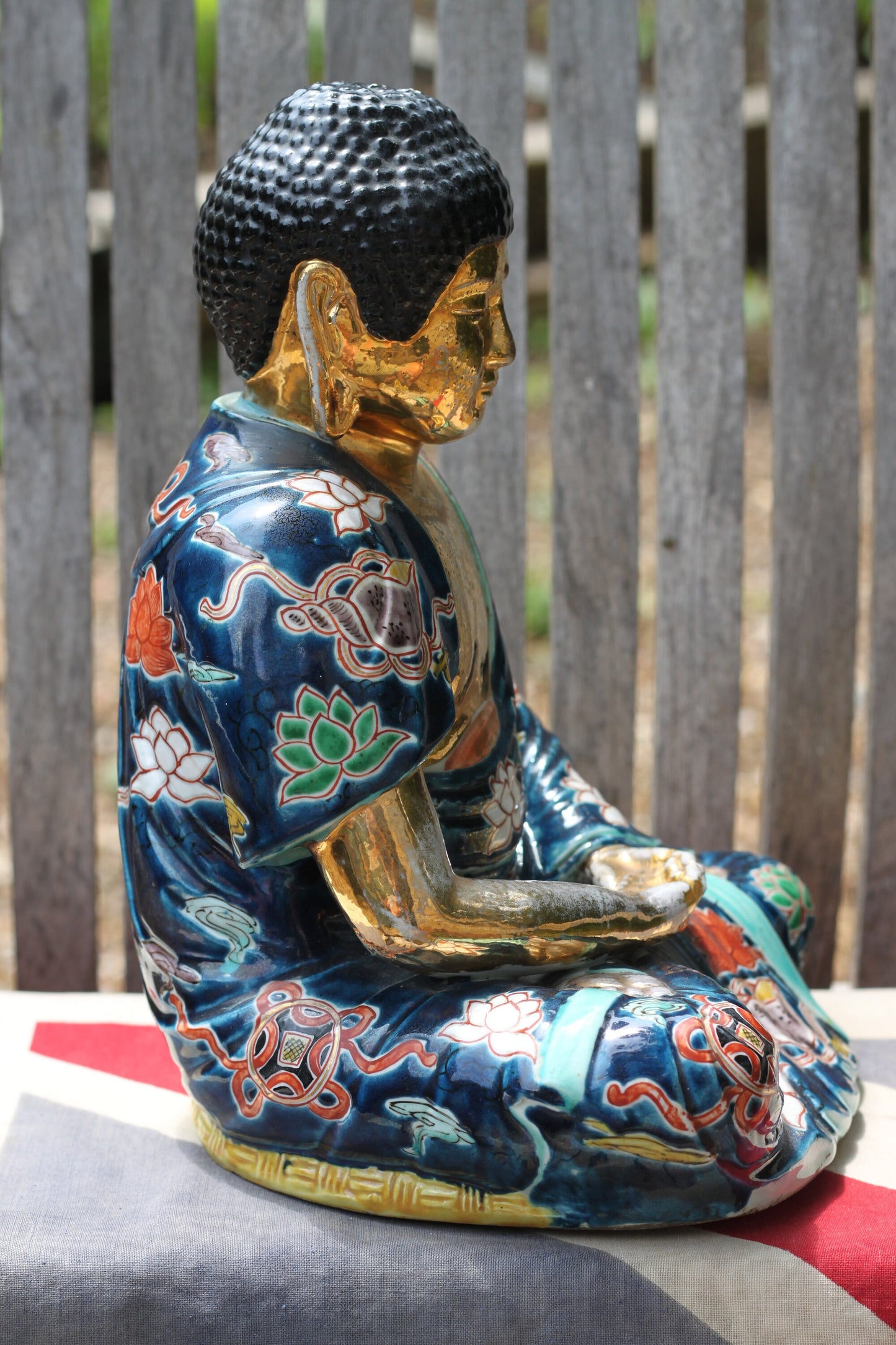 A Large Ceramic Seated Gold Buddha in Colourful Robes 29cm Tall - 2.8kg