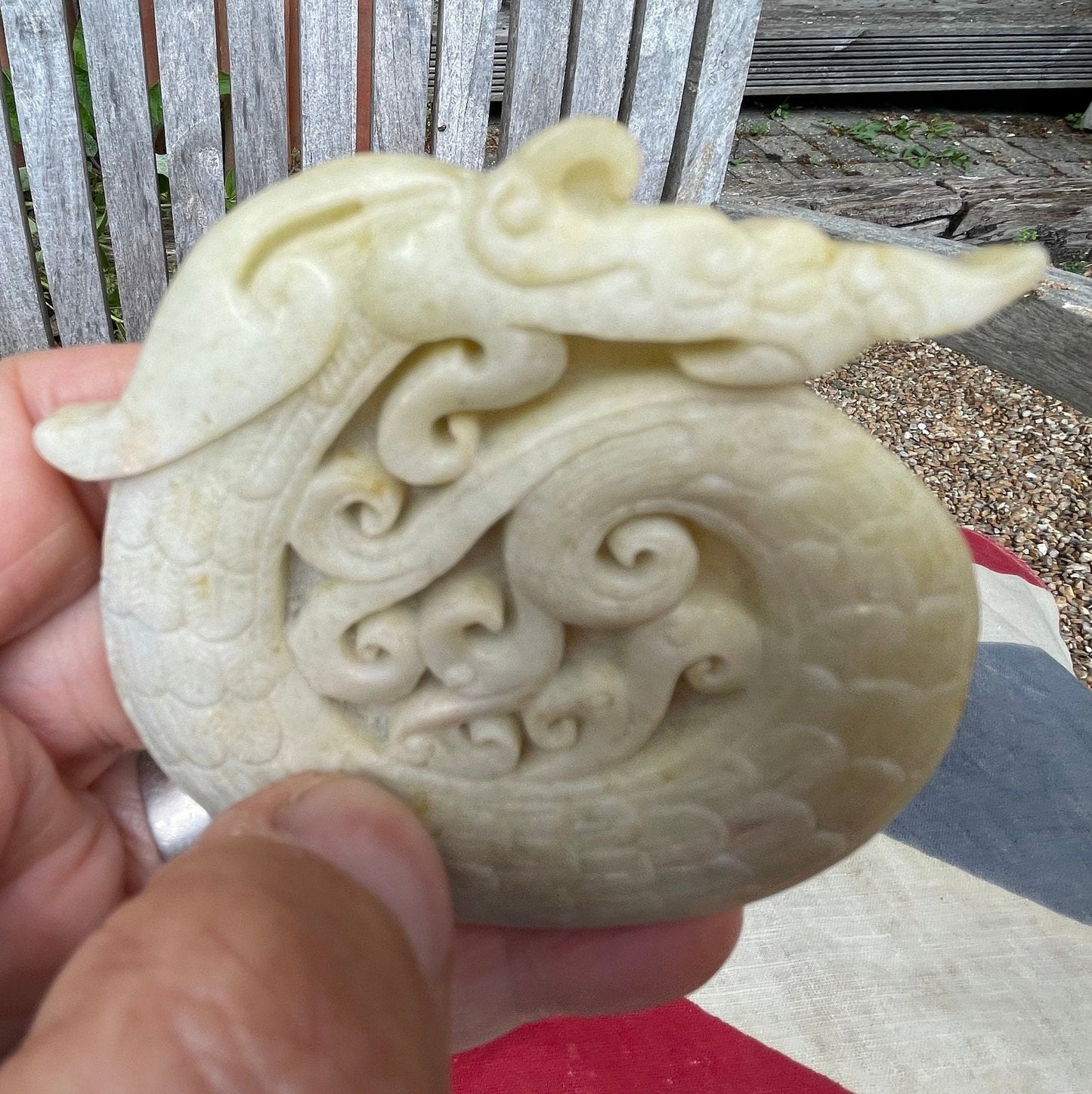 A Chinese Hardstone Disc Carving of a Curled up Dragon 8cm Diameter.