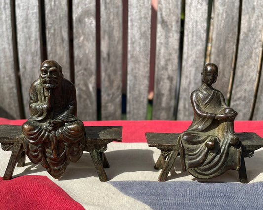 A Close Pair of Chinese Patinated Copper Bronze Figures of Scholars on Benches, the Largest 7.5cm Wide