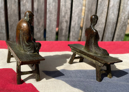 A Close Pair of Chinese Patinated Copper Bronze Figures of Scholars on Benches, the Largest 7.5cm Wide