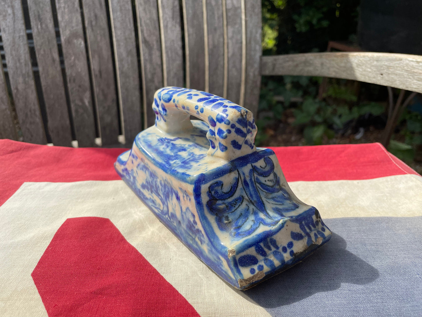 An 18th Century Dutch Delft Pottery Desk Blotter With Polychrome Design of a Dog, Length 17cm