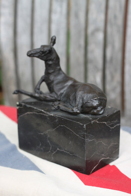 A  Patinated Bronze Study of a Recumbent Llama/Deer on a Black Marble Base Signed  L. Carvin, , 14cm in Length 1.98kg