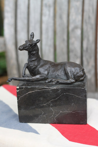 A  Patinated Bronze Study of a Recumbent Llama/Deer on a Black Marble Base Signed  L. Carvin, , 14cm in Length 1.98kg