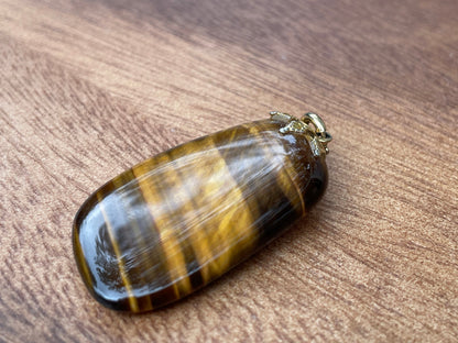 A Couple of Tiger's Eye Drop Pendants Larger With Silver Mount and 4cm Tall