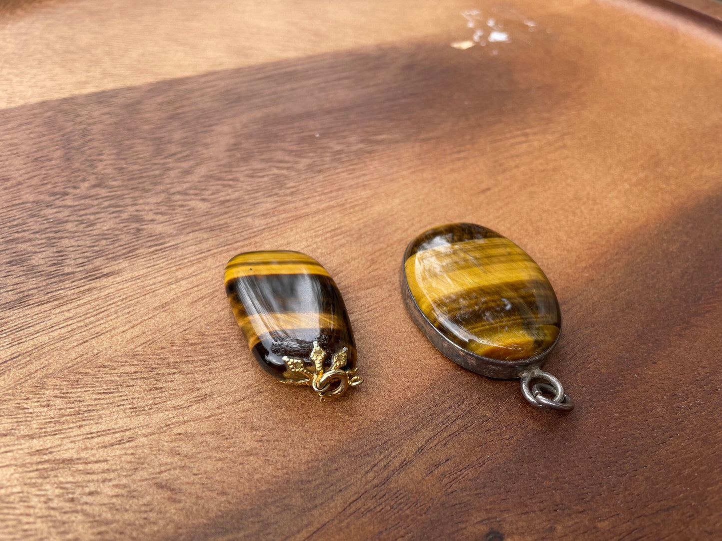 A Couple of Tiger's Eye Drop Pendants Larger With Silver Mount and 4cm Tall