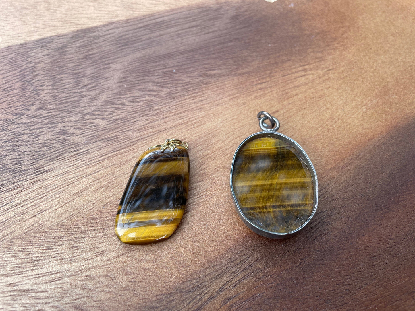 A Couple of Tiger's Eye Drop Pendants Larger With Silver Mount and 4cm Tall