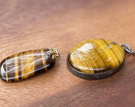 A Couple of Tiger's Eye Drop Pendants Larger With Silver Mount and 4cm Tall