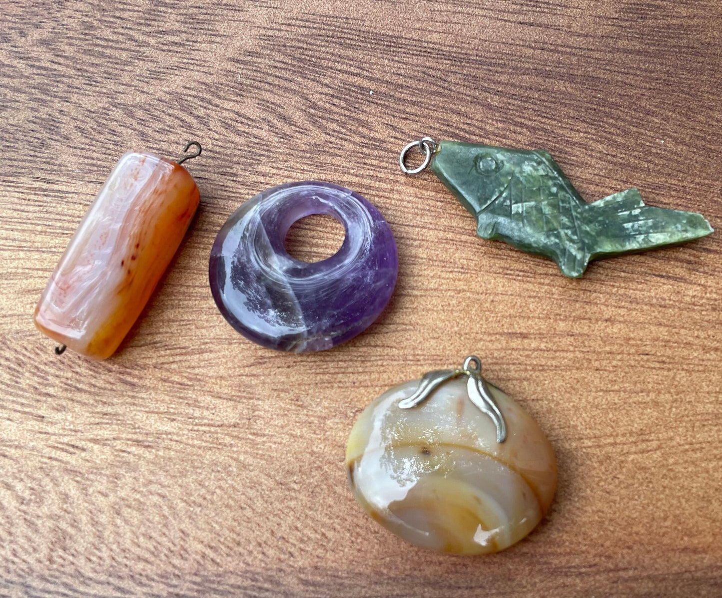 A Small Collection of 4 Stone and Agate Pendants Including Carnelian, Amethyst Largest 5cm Long