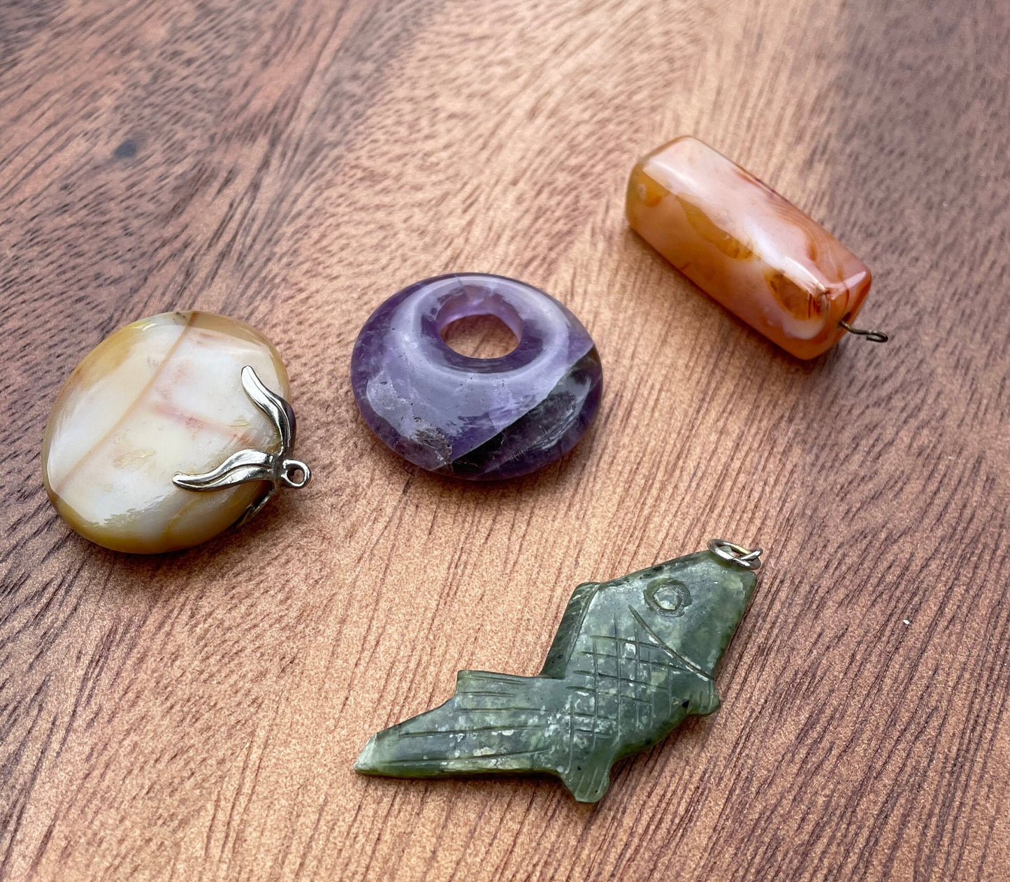 A Small Collection of 4 Stone and Agate Pendants Including Carnelian, Amethyst Largest 5cm Long