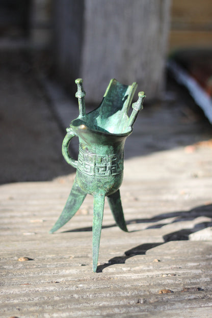 A Chinese Bronze Archaistic Tripod Jue Cup (ex. Late Prof. R.M. Hicks OBE), 18cm Tall