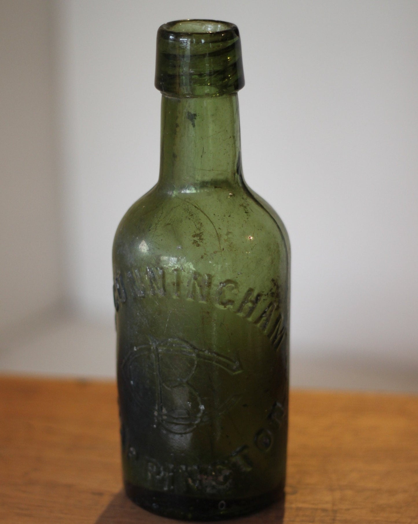 A Vintage Green Beer Bottle Embossed B Cunningham Warrington 19.5cm Tall