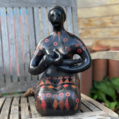 A Large Glazed Terracotta Blackware Sculpture of a Mother Figure Feeding Her Baby, in the manner of Manuel Felguerez , 39 cm's Tall