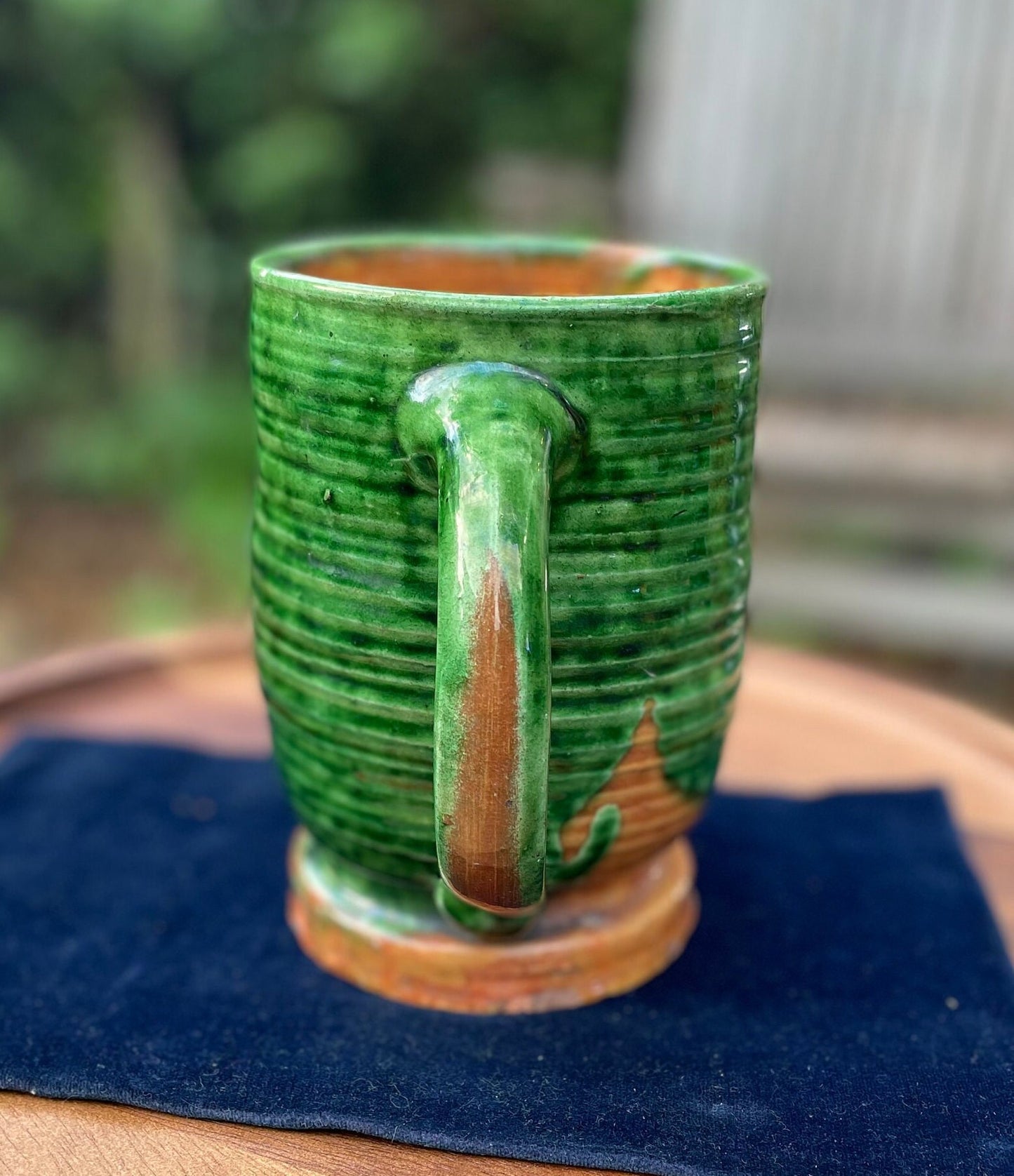 A 19th Century Green Glazed Two Handled Loving Cup by Edwin Beer Fishley for Fremington Pottery Devon (1832 - 1911)  15.5cm Tall