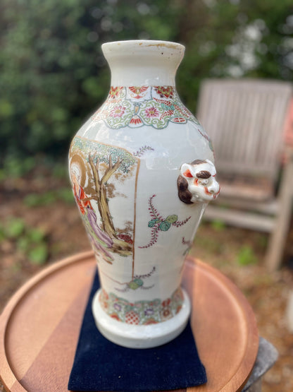 A Large Chinese Late 19th Century White Glaze Porcelain Vase With Hand Painted Figures, Bands of Blossom and Dog of Fo Handles, Height 37cm