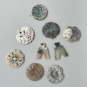 A Large Group of Jade and Nephrite Pendants Average 5cm Diameter