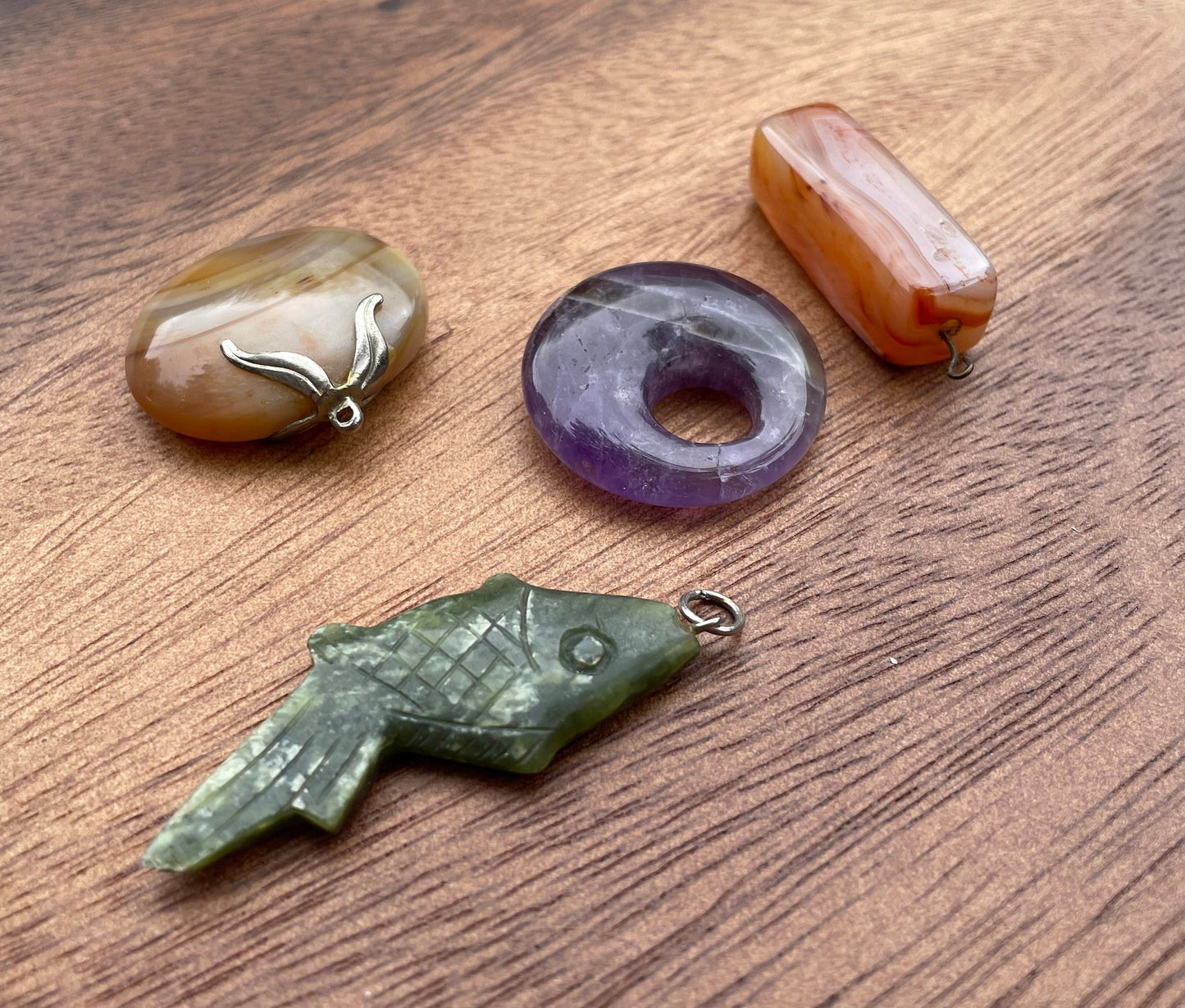 A Small Collection of 4 Stone and Agate Pendants Including Carnelian, Amethyst Largest 5cm Long