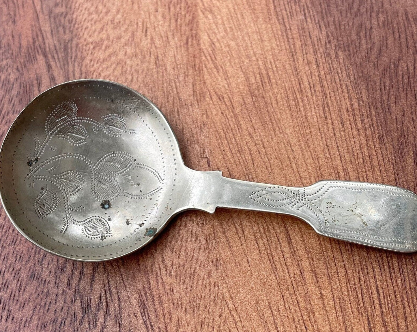 An early 19th century George III silver plated caddy spoon by William Parkin of Sheffield 9.5cm long