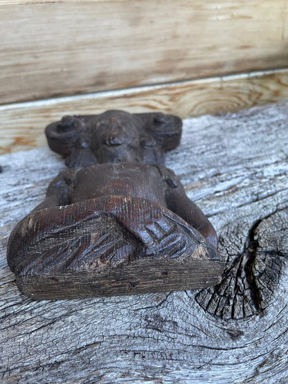 A 17th Century Carved Oak Figural Folk Art Corbel Depicting a Bearded Man 16cm Tall