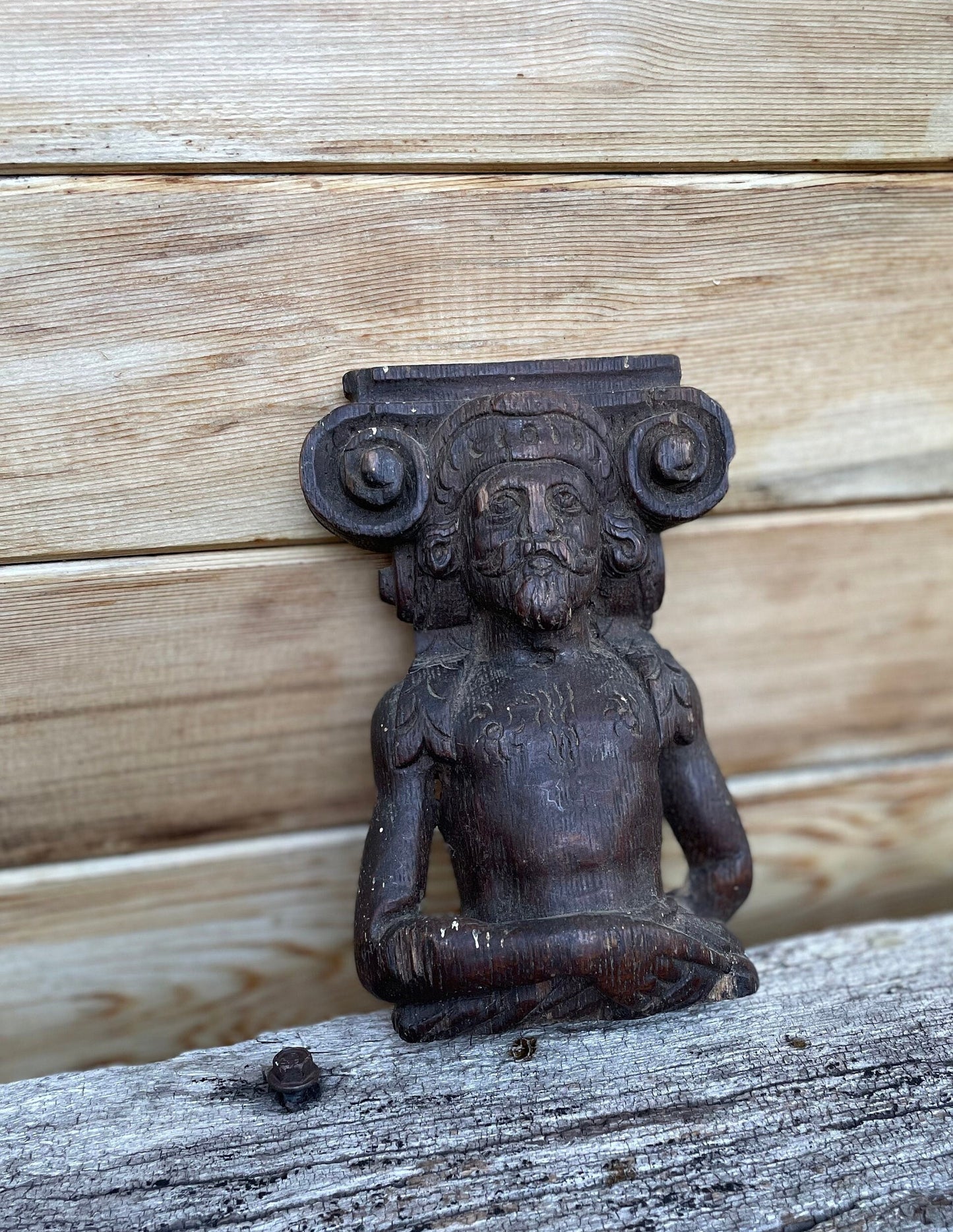 A 17th Century Carved Oak Figural Folk Art Corbel Depicting a Bearded Man 16cm Tall