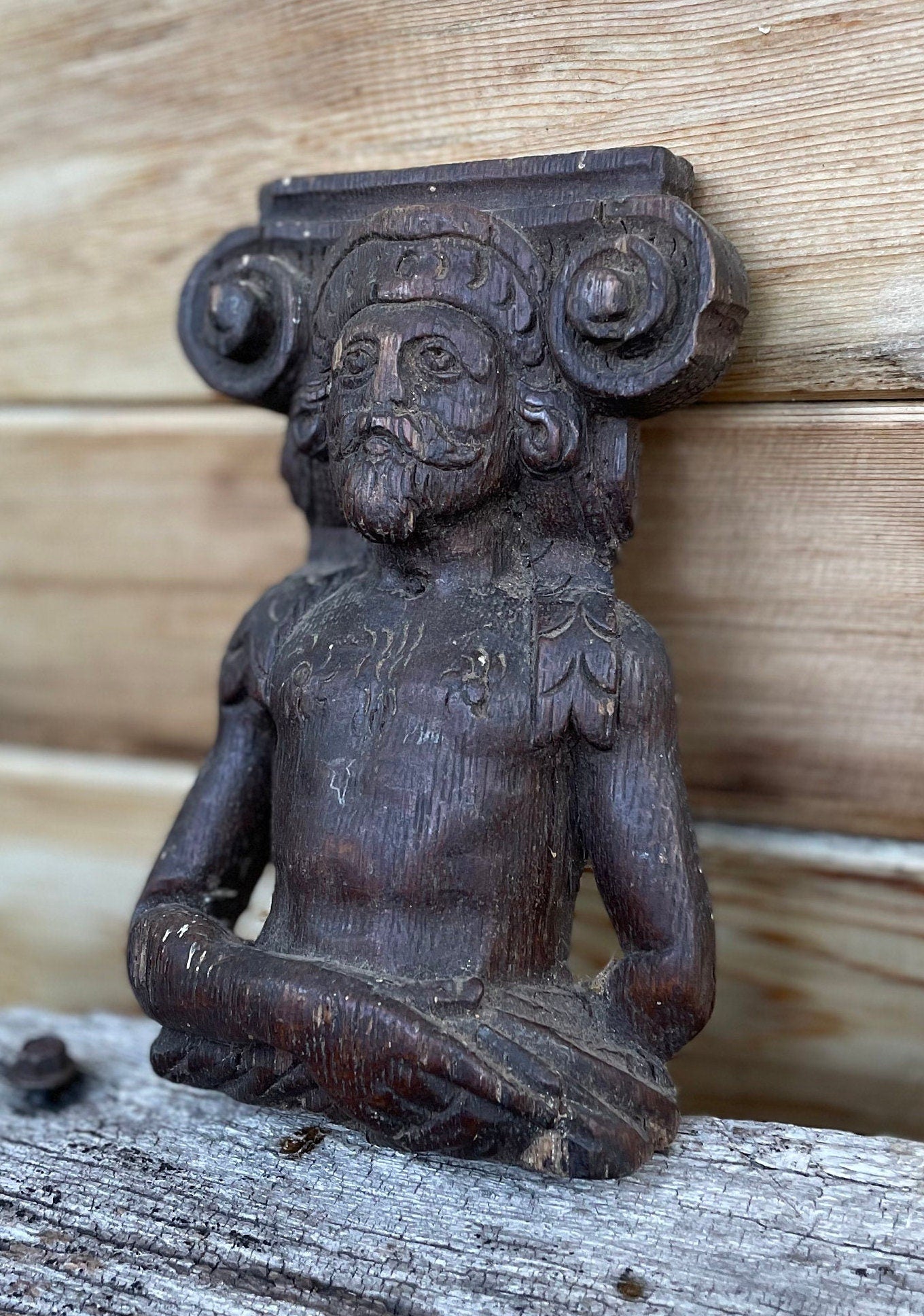 A 17th Century Carved Oak Figural Folk Art Corbel Depicting a Bearded Man 16cm Tall