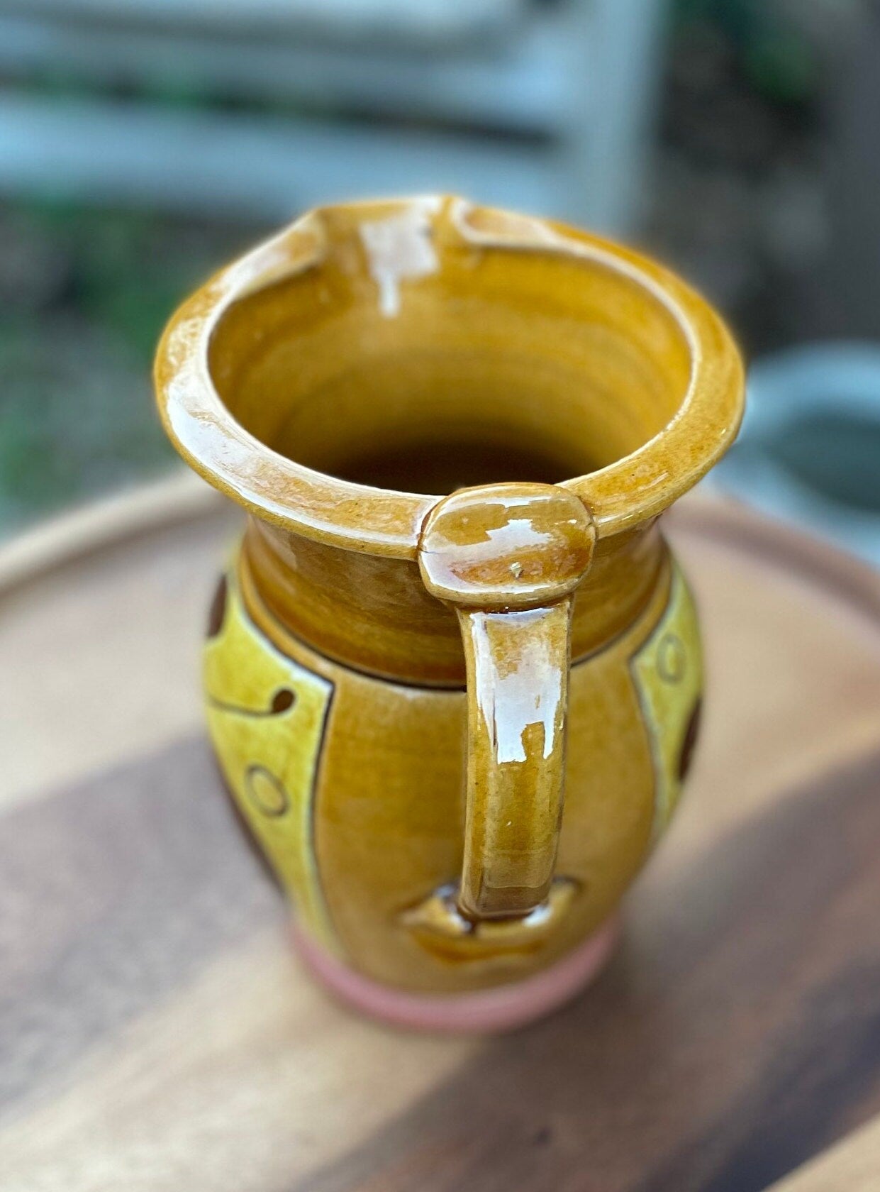 An Earthenware Jug With Slip Decoration, Makers Mark to Base Attributed to Norah Braden (1901-2001) Height 17cm