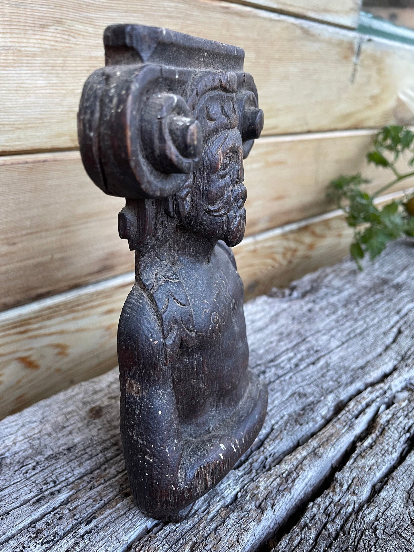 A 17th Century Carved Oak Figural Folk Art Corbel Depicting a Bearded Man 16cm Tall