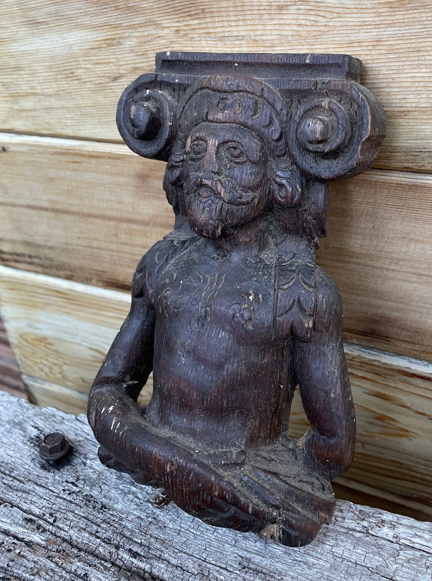 A 17th Century Carved Oak Figural Folk Art Corbel Depicting a Bearded Man 16cm Tall