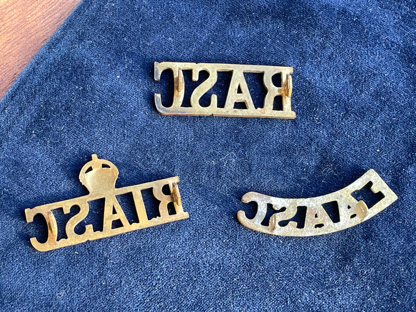 Three Military Uniform Brass Shoulder Titles  British, Indian and African