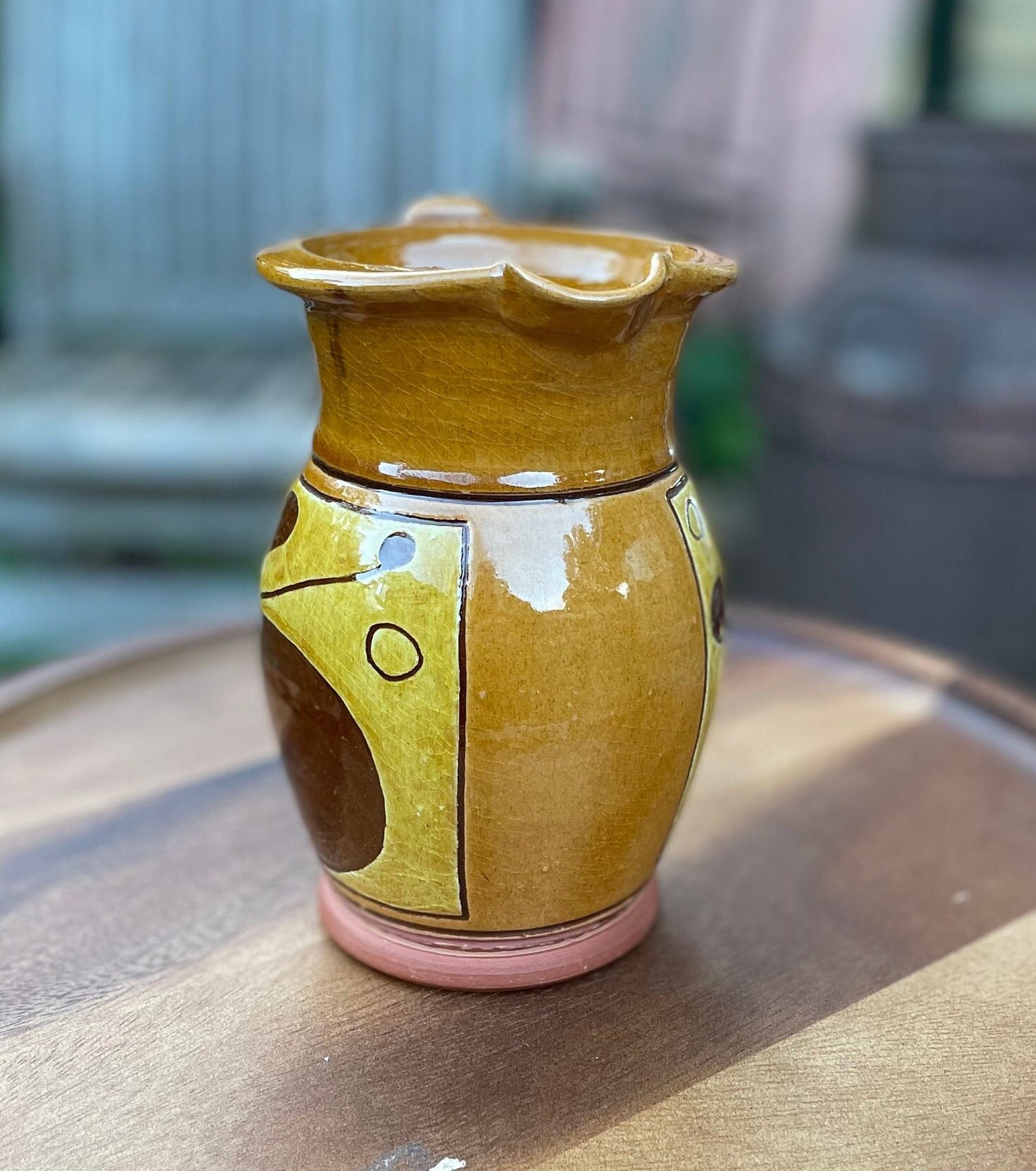 An Earthenware Jug With Slip Decoration, Makers Mark to Base Attributed to Norah Braden (1901-2001) Height 17cm