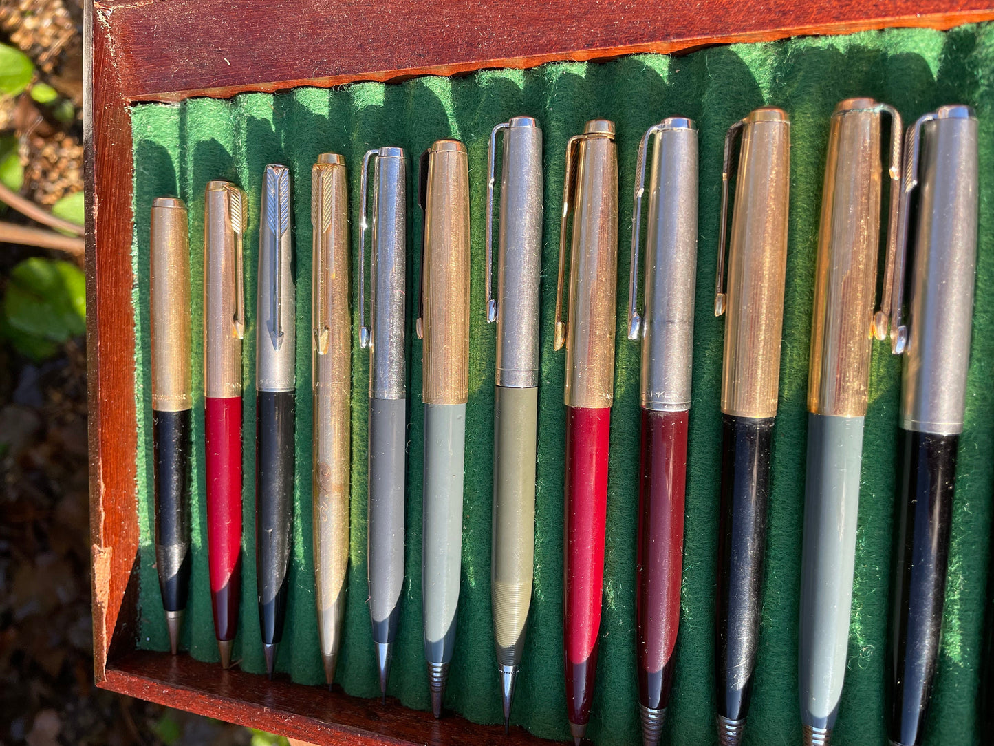 A Fine Collection of Parker Propelling/Clutch Pencils and Ball Points in a Hard Wood Presentation Case