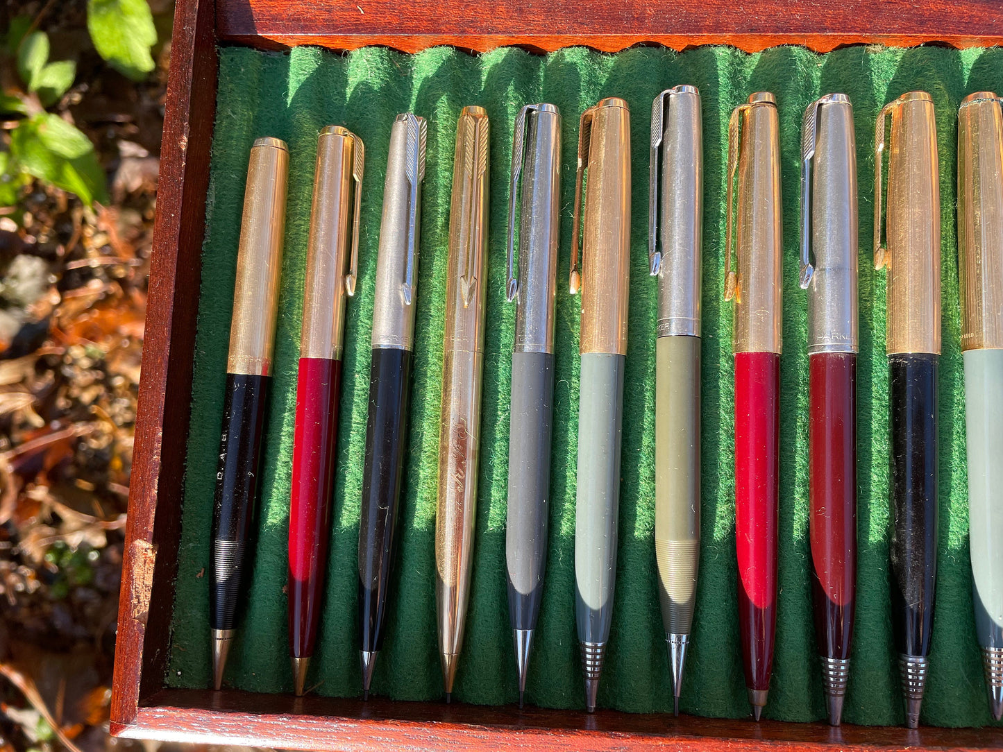 A Fine Collection of Parker Propelling/Clutch Pencils and Ball Points in a Hard Wood Presentation Case