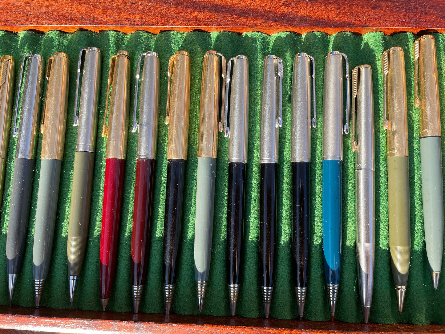 A Fine Collection of Parker Propelling/Clutch Pencils and Ball Points in a Hard Wood Presentation Case