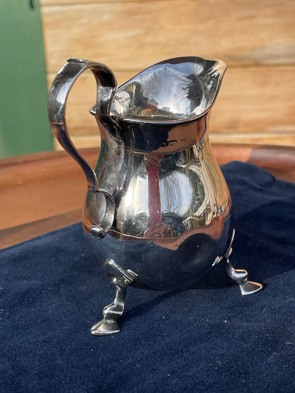 A Small Solid Silver Cream Jug Made in Birmingham 1921 (very rubbed Assay marks) 9cm Tall  -81grams