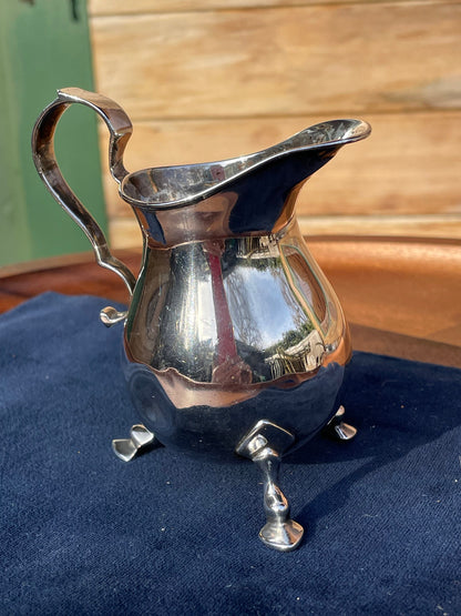 A Small Solid Silver Cream Jug Made in Birmingham 1921 (very rubbed Assay marks) 9cm Tall  -81grams