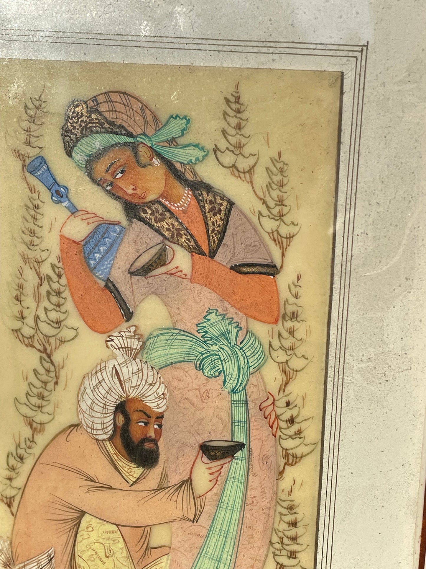 A Persian Hand Painted Panel With two Figures Housed in a Vizagapatam Style Easel Frame  31.5cm Tall